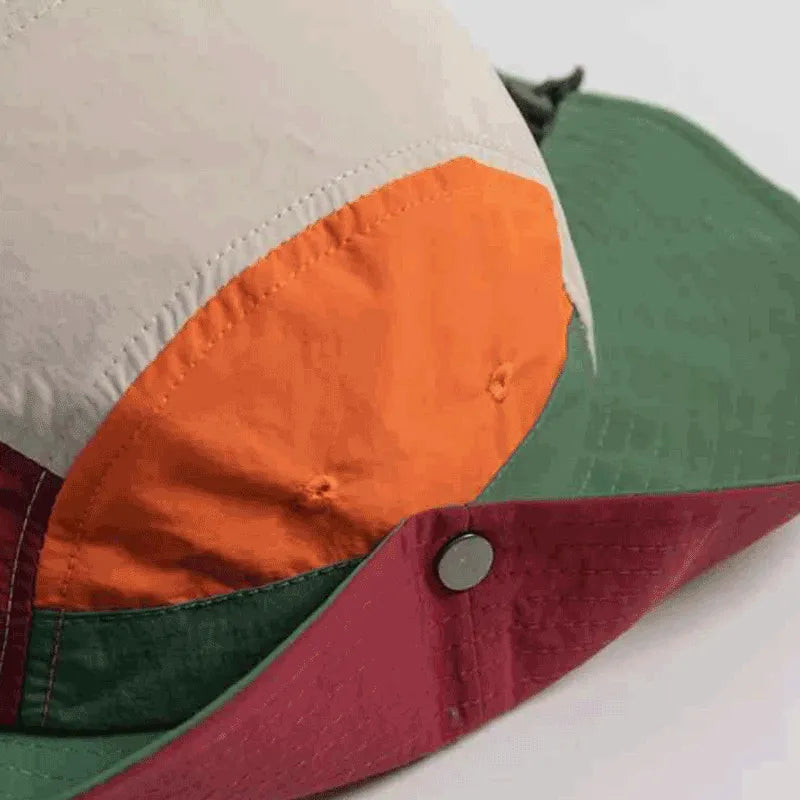 Close-up do painel lateral com costura reforçada e botão de fixação, garantindo durabilidade e Alto Valor nos detalhes.