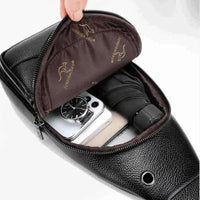 Vista interna da bolsa, mostrando a organização interna para celular e guarda-chuva compacto, garantindo segurança de pertences.